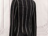 black and white striped jacket on a mannequin mannequin mannequin mannequin mannequin mannequin mannequin mannequin mann