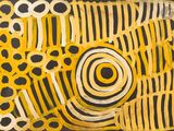 tableau représentant un poisson jaune à rayures noires et blanches sur fond noir