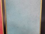 a close up of a book with a red cover and a blue cover