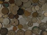 a lot of coins that are on the table