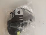 a pair of shoes that are wrapped in plastic