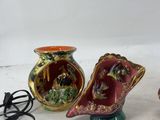 three vases that are sitting next to each other on a table