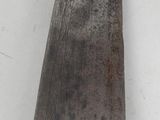 a large metal object that is on a white surface