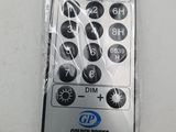 a remote control in a plastic bag on a table