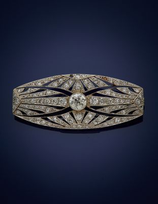 an art deco diamond and gold broochle