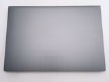 a laptop that is sitting on a white table