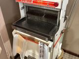 a machine that is sitting in the corner of a room