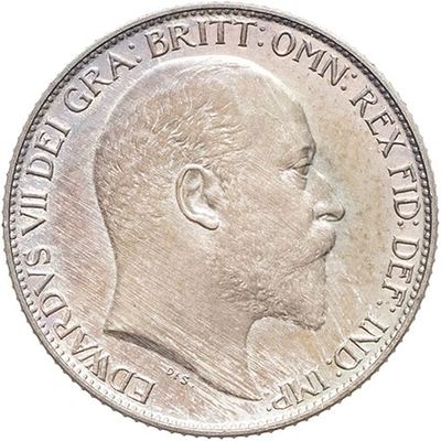 a close up of a coin with a man ' s face on it