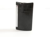 a black lighter that is sitting on a white surface