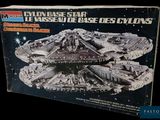 the box is open to show the model of the millennium destroyer
