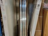 a picture of a stainless steel water heater in a warehouse