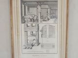 a picture hanging on the wall above a bed
