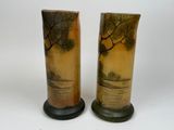 pair of vases with trees on them on a white background