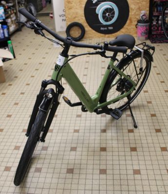 a bike that is sitting on the floor in a store