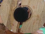 a large piece of wood sitting on top of a cardboard box