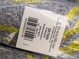 a bag of yarn with a price tag on it