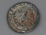 a close up of a silver coin with a picture of a man on it