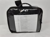 a black suitcase with a list of items in it
