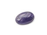 a purple stone with a white background on a white surface