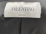a close up of a label on the back of a jacket
