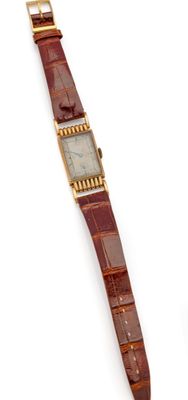 an image of a wrist watch sitting on top of a white surface
