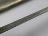 a close up of a pair of scissors on a table