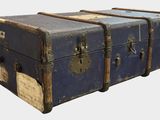 three old suitcases stacked on top of each other
