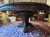 an image of a table in a room with a rug