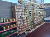 a large display in a grocery store with lots of food