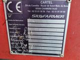 a sign on the side of a red machine