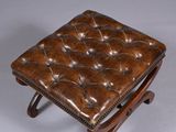 leather foot stool with wooden frame and foot rest