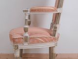 a chair that is sitting on the floor in a room