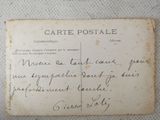 an old postcard with a handwritten message on it