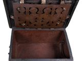 an old wooden chest with a metal latch on it