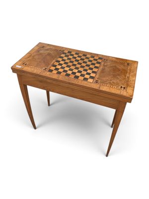 an image of a wooden table with a chess board on top of it