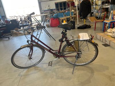 a bike that is parked inside of a building