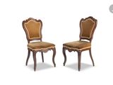 pair of chairs with upholstered back and upholstered seat