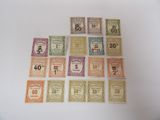 several different colored stamps with numbers on them on a white surface