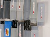 a lot of plastic storage boxes that are on the table