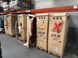 many boxes that are lined up in a warehouse