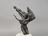 statue of a man holding a woman in his arms