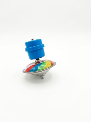 a small toy that is sitting on top of a small object