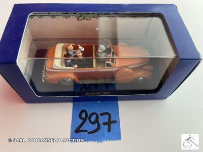 une image représentant une petite voiture dans une boîte, avec une étiquette de prix dessus