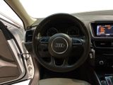 dashboard view of a car with a steering wheel and dashboard controls