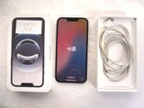 two iphones that are sitting in a box on a table