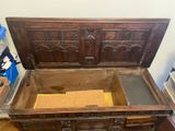 a wooden chest with a wooden top and a wooden bottom