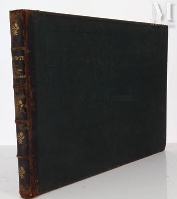 an old book sitting on top of a white table next to a white wall