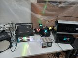 a table that has a lot of electronics on top of it