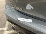 a close up of a car with a sticker on it ' s bumper