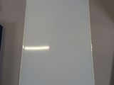 a picture of a white board on a wall in a room